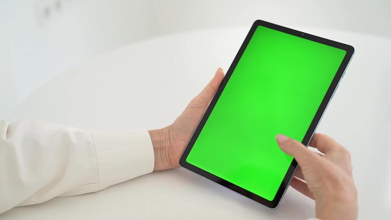 Person using GOT ONE TV+ streaming service on a modern tablet device